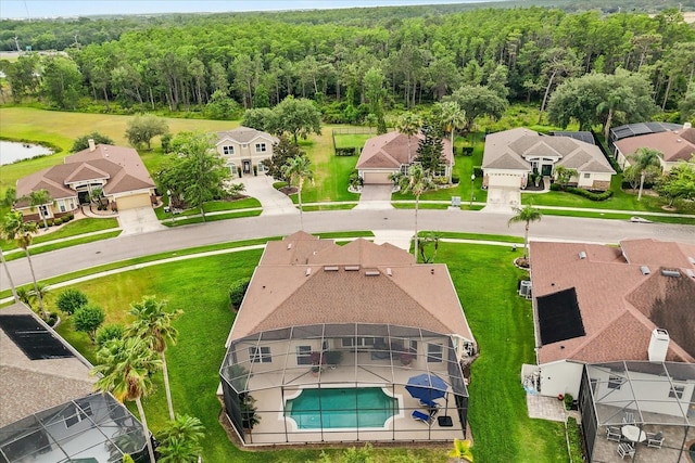 14174 Islamorada Dr, Orlando, FL 32837 - aerial view of residential area with a forest and a pool
