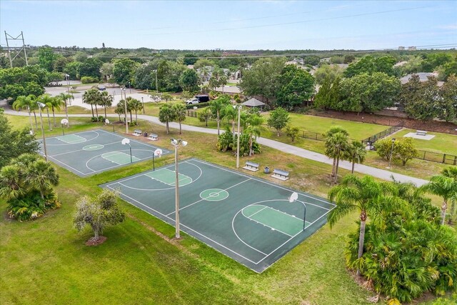 14174 Islamorada Dr, Orlando, FL 32837 - view of basketball court featuring community basketball court and a yard