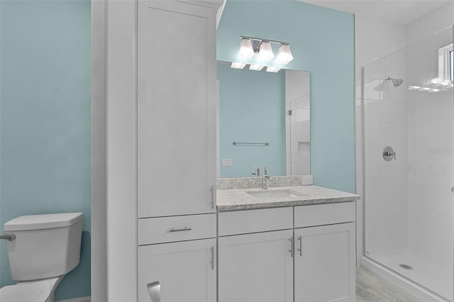 867 Bama Breeze Dr, Daytona Beach, FL 32124 - bathroom with a shower stall, toilet, and vanity