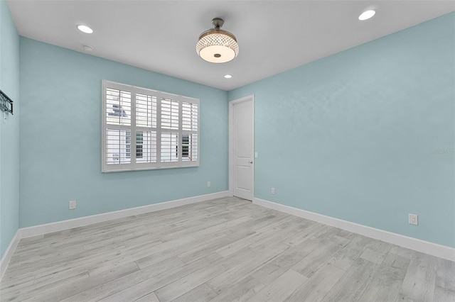 867 Bama Breeze Dr, Daytona Beach, FL 32124 - unfurnished room with wood finished floors, baseboards, and recessed lighting
