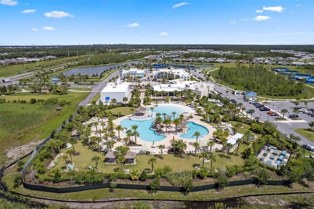 867 Bama Breeze Dr, Daytona Beach, FL 32124 - aerial view of property's location with a pool and a nearby body of water