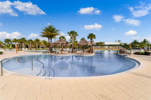867 Bama Breeze Dr, Daytona Beach, FL 32124 - community pool featuring a patio area and a gazebo