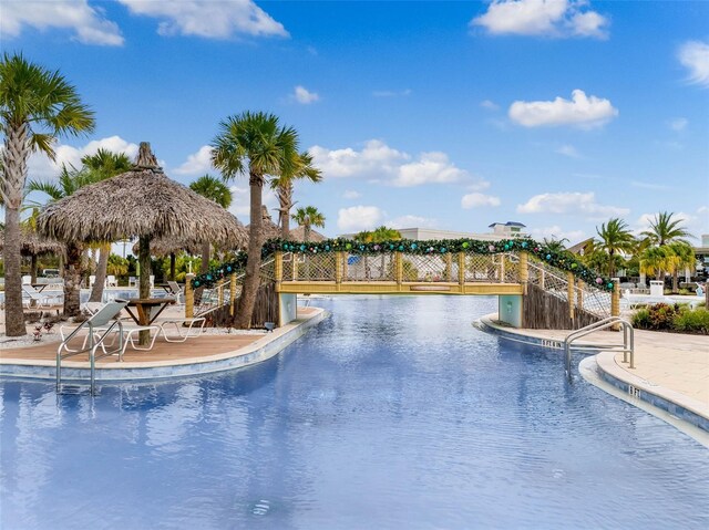 867 Bama Breeze Dr, Daytona Beach, FL 32124 - community pool with fence, a patio, and a gazebo
