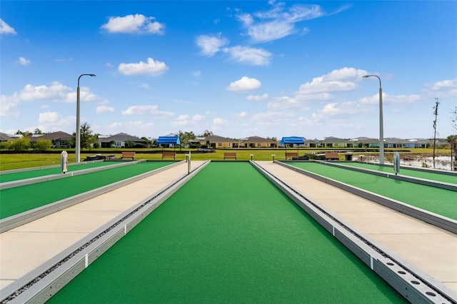 867 Bama Breeze Dr, Daytona Beach, FL 32124 - view of community featuring a game area and a residential view