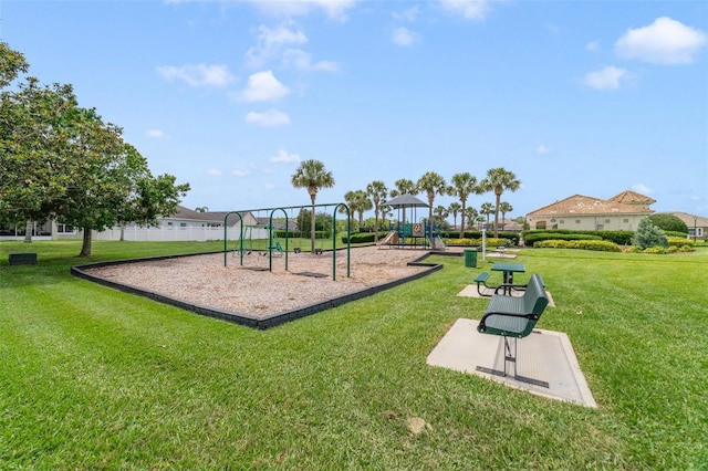 2956 White Cedar Cir, Kissimmee, FL 34741 - community jungle gym featuring a lawn