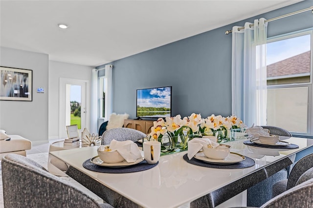 dining space with recessed lighting