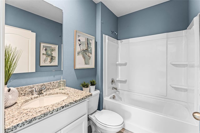 bathroom with vanity, toilet, and tub / shower combination