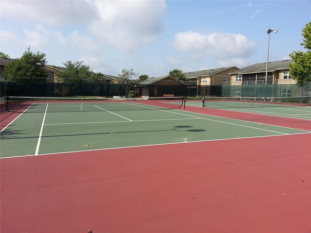 9926 Turf Way Unit 8, Orlando, FL 32837 - view of tennis court with community basketball court and fence
