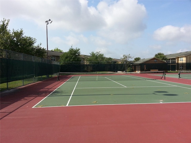 9926 Turf Way Unit 8, Orlando, FL 32837 - view of tennis court with fence and community basketball court