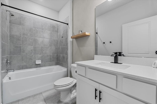 full bathroom with toilet, washtub / shower combination, tile patterned flooring, and vanity