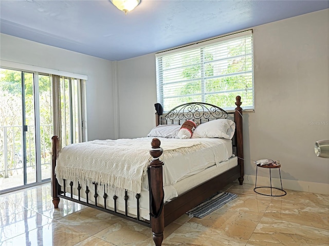 1820 James Ave Unit 2F, Miami Beach, FL 33139 - bedroom featuring access to outside and baseboards