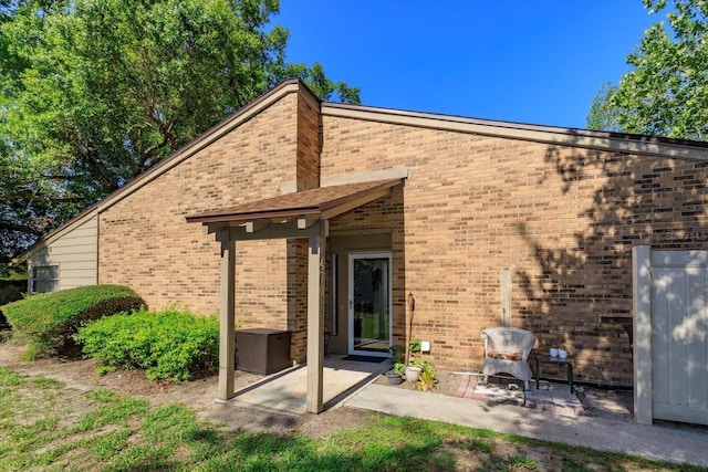 470 Oak Haven Dr Unit 470, Altamonte Springs, FL 32701 - back of property with a patio area and brick siding
