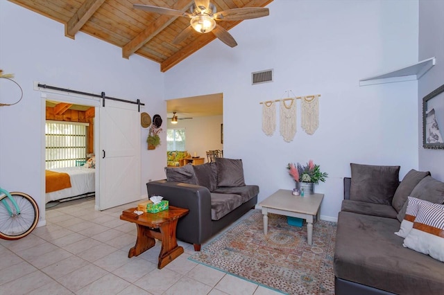 470 Oak Haven Dr Unit 470, Altamonte Springs, FL 32701 - living room with a barn door, ceiling fan, wood ceiling with exposed beams, light tile patterned floors, and high vaulted ceiling