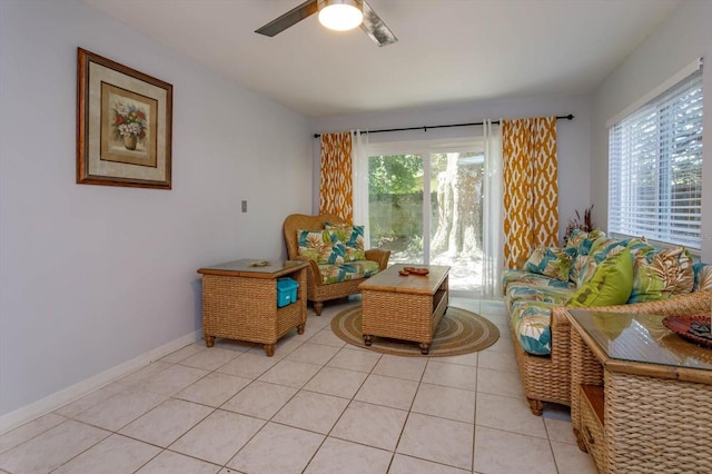 470 Oak Haven Dr Unit 470, Altamonte Springs, FL 32701 - living area with a ceiling fan, light tile patterned flooring, and baseboards