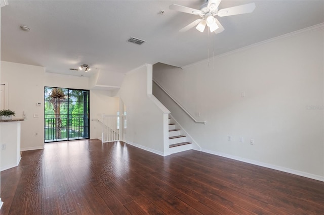 unfurnished living room featuring wood finished floors, ceiling fan, baseboards, stairs, and ornamental molding