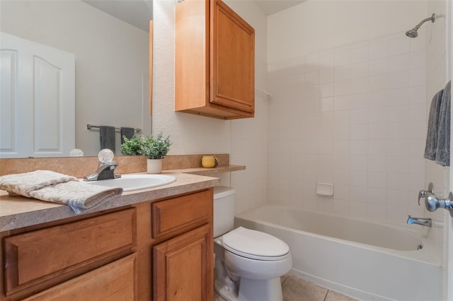 full bath featuring toilet, vanity, washtub / shower combination, and tile patterned flooring