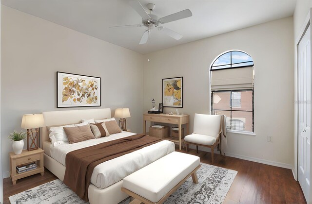 6107 Metrowest Blvd Unit 104, Orlando, FL 32835 - bedroom with multiple windows, wood finished floors, and baseboards