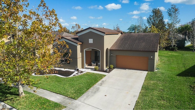 view of front facade with stucco siding, an attached garage, a front lawn, concrete driveway, and roof with shingles