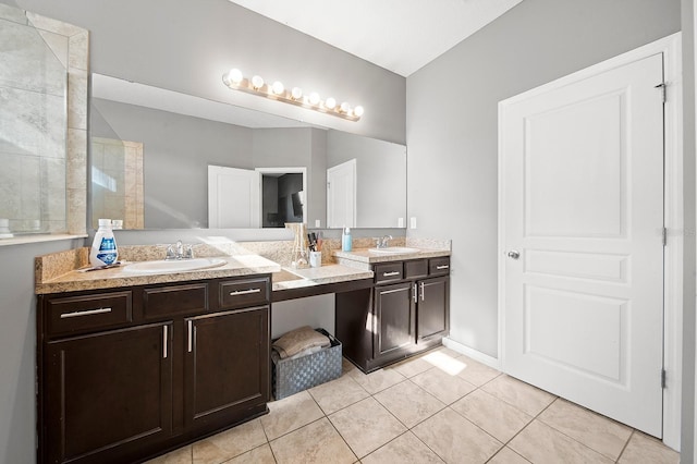 full bathroom with tile patterned floors and double vanity
