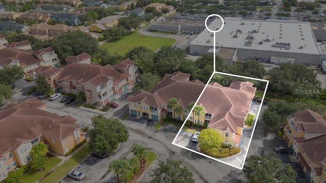 12220 Wild Iris Way Unit 103, Orlando, FL 32837 - aerial view of residential area featuring property boundaries highlighted