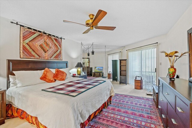 3987 Lancashire Ln Unit 3987, Longwood, FL 32779 - bedroom with access to exterior, carpet flooring, and ceiling fan