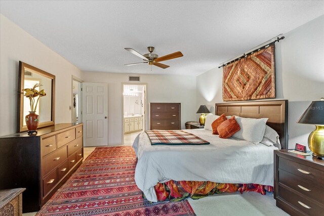 3987 Lancashire Ln Unit 3987, Longwood, FL 32779 - bedroom with carpet, connected bathroom, and ceiling fan