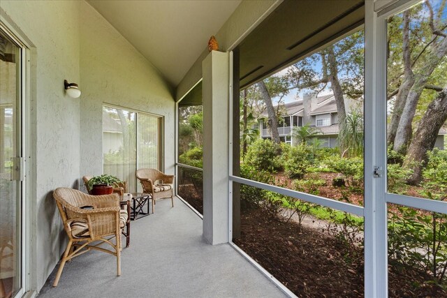 3987 Lancashire Ln Unit 3987, Longwood, FL 32779 - sunroom featuring vaulted ceiling and plenty of natural light
