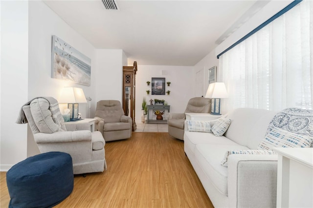 1804 W Shores Rd, Melbourne, FL 32935 - living area featuring light wood finished floors and baseboards