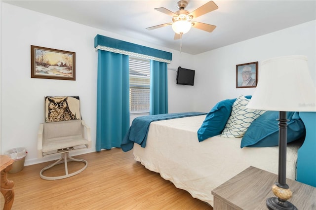 1804 W Shores Rd, Melbourne, FL 32935 - bedroom with light wood finished floors and a ceiling fan