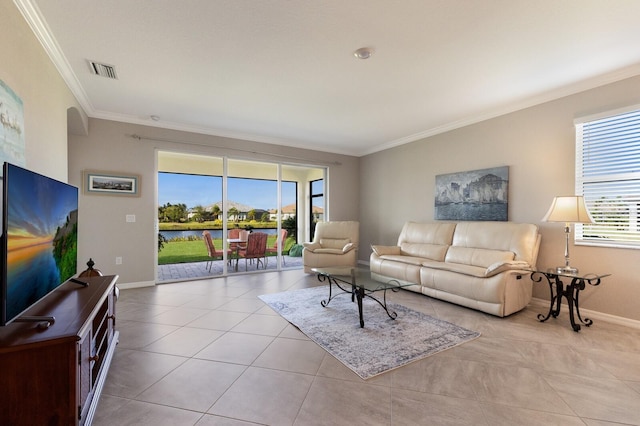 2532 Avolet Ct, Lakewood Ranch, FL 34211 - living room featuring ornamental molding, light tile patterned floors, baseboards, and a water view