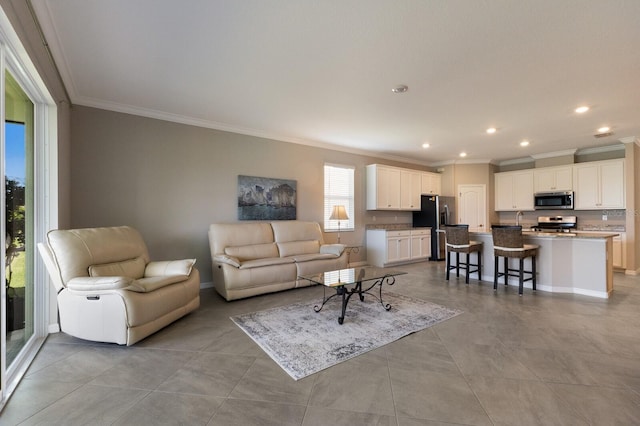 2532 Avolet Ct, Lakewood Ranch, FL 34211 - living area featuring ornamental molding, recessed lighting, and baseboards