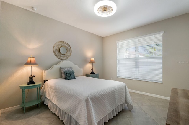 2532 Avolet Ct, Lakewood Ranch, FL 34211 - bedroom featuring light tile patterned floors and baseboards