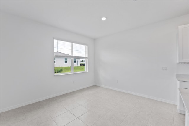 499 Silver Palm Dr, Haines City, FL 33844 - spare room featuring recessed lighting and light tile patterned floors