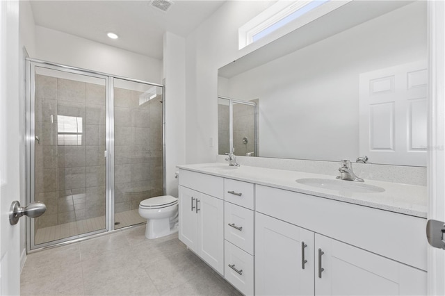 499 Silver Palm Dr, Haines City, FL 33844 - full bath with a stall shower, double vanity, tile patterned floors, and recessed lighting
