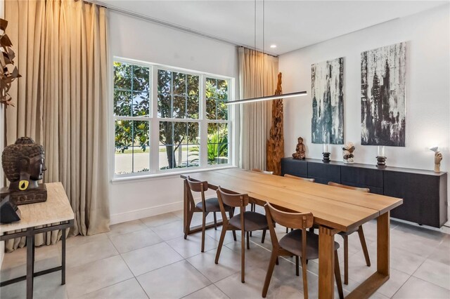 8160 Iron Mountain Trl, Windermere, FL 34786 - dining area featuring healthy amount of natural light, light tile patterned flooring, recessed lighting, and baseboards
