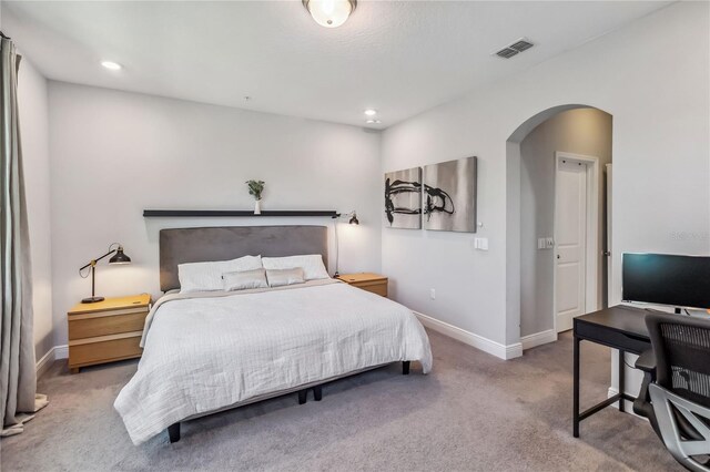 8160 Iron Mountain Trl, Windermere, FL 34786 - carpeted bedroom with arched walkways, baseboards, recessed lighting, and a desk