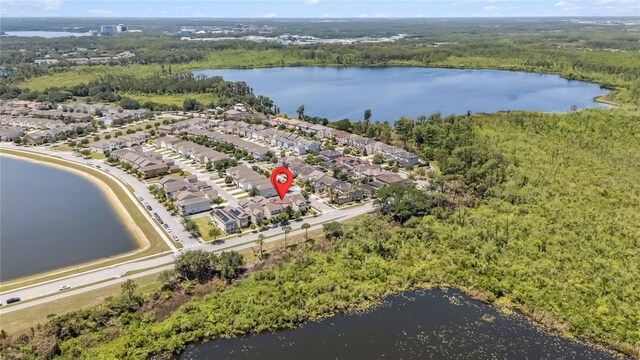 8160 Iron Mountain Trl, Windermere, FL 34786 - aerial perspective of suburban area with a large body of water and a forest