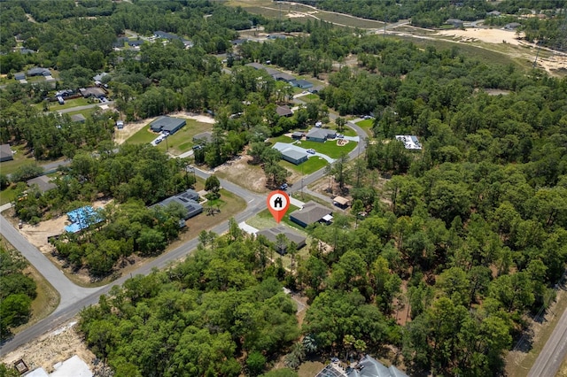 7104 N Maltese Dr, Citrus Springs, FL 34433 - aerial view of property's location featuring a forest