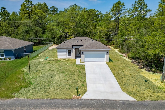 7104 N Maltese Dr, Citrus Springs, FL 34433 - single story home featuring driveway, a front lawn, an attached garage, stucco siding, and a wooded view