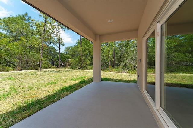 7104 N Maltese Dr, Citrus Springs, FL 34433 - view of patio / terrace featuring view of wooded area