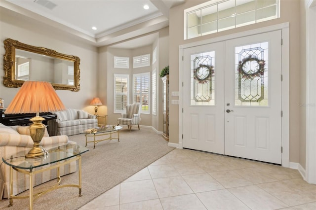 724 Duff Dr, Winter Garden, FL 34787 - tiled foyer entrance featuring carpet, baseboards, ornamental molding, and recessed lighting