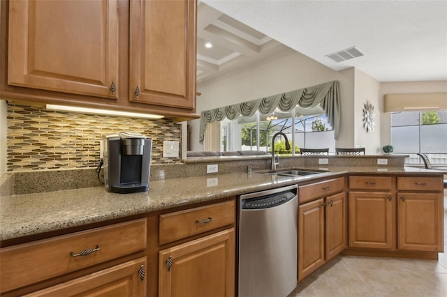 724 Duff Dr, Winter Garden, FL 34787 - kitchen featuring dishwasher, a sink, light stone counters, brown cabinetry, and beamed ceiling