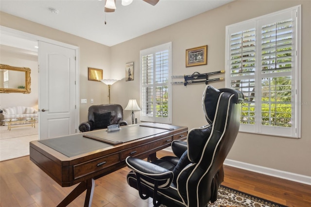 724 Duff Dr, Winter Garden, FL 34787 - office area with ceiling fan, wood finished floors, and baseboards