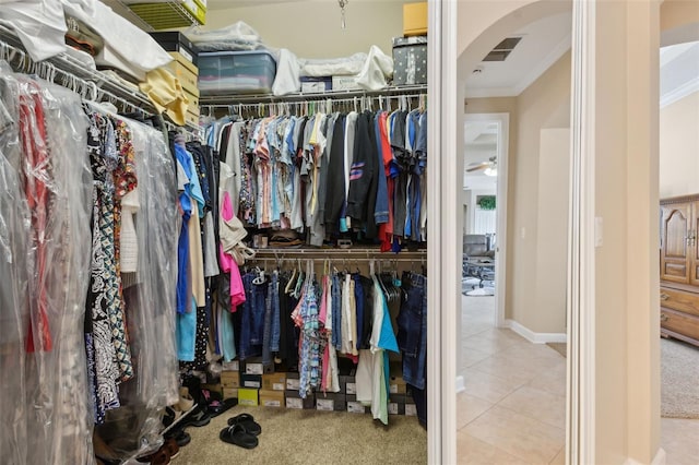 724 Duff Dr, Winter Garden, FL 34787 - spacious closet featuring arched walkways and tile patterned flooring
