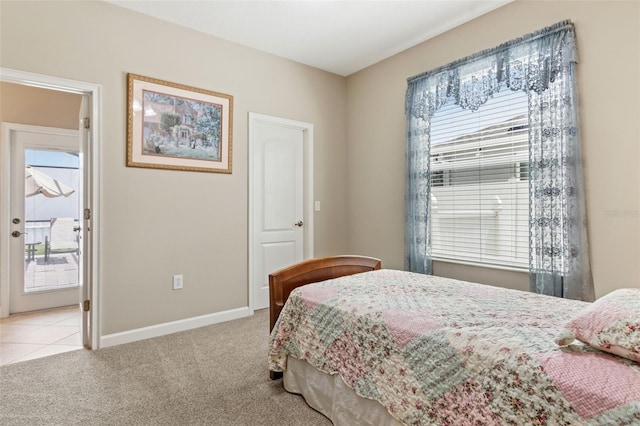 724 Duff Dr, Winter Garden, FL 34787 - bedroom featuring light colored carpet, baseboards, and access to outside