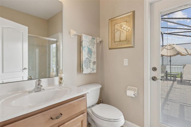 724 Duff Dr, Winter Garden, FL 34787 - bathroom with vanity, plenty of natural light, toilet, and a shower with door