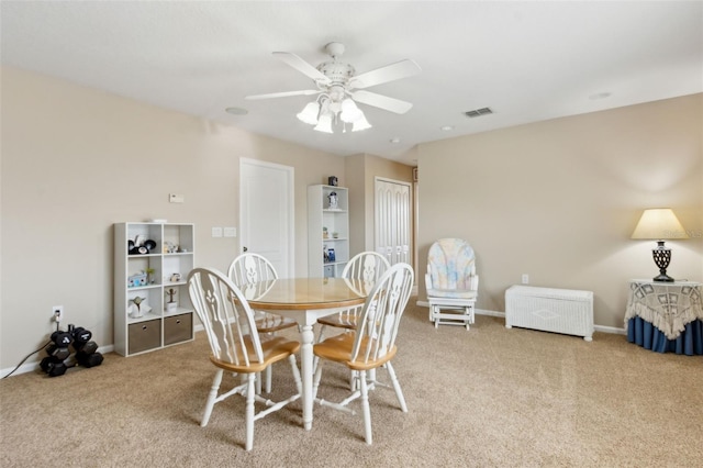 724 Duff Dr, Winter Garden, FL 34787 - carpeted dining room with ceiling fan and baseboards