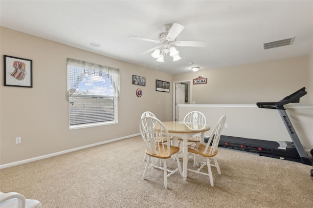 724 Duff Dr, Winter Garden, FL 34787 - carpeted dining room with baseboards and ceiling fan
