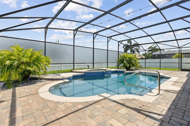 724 Duff Dr, Winter Garden, FL 34787 - view of pool featuring a patio area, a pool with connected hot tub, and glass enclosure