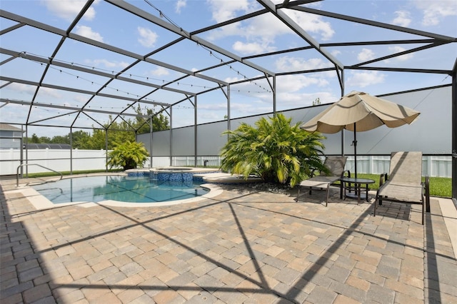 724 Duff Dr, Winter Garden, FL 34787 - view of swimming pool featuring a patio, a pool with connected hot tub, and a lanai